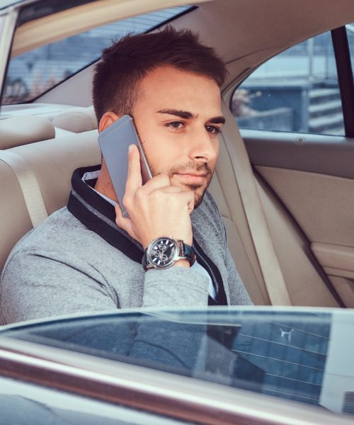 a-handsome-businessman-in-luxury-car-1.jpg